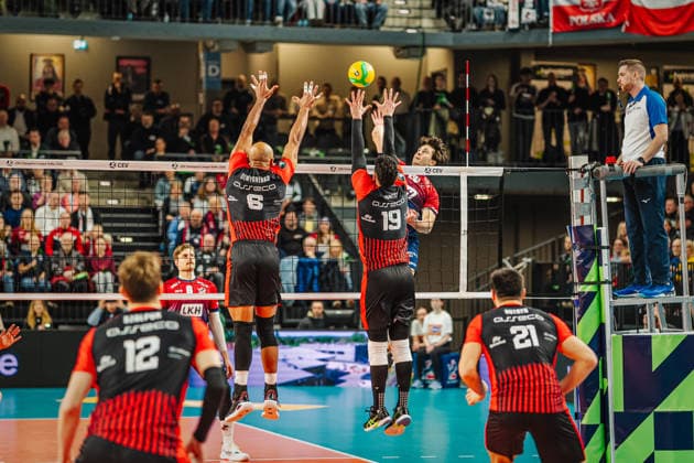 Volleyball Men CEV Champions League 2026 SVG Lüneburg vs Asseco Resovia Rzeszow 27 01 2026 Ethan Champlin 20 SVG Lüneburg against the block of Danny Demyanenko 6 Asseco Resovia Rzeszow and Marcin Janusz 19 Asseco Resovia Rzeszow