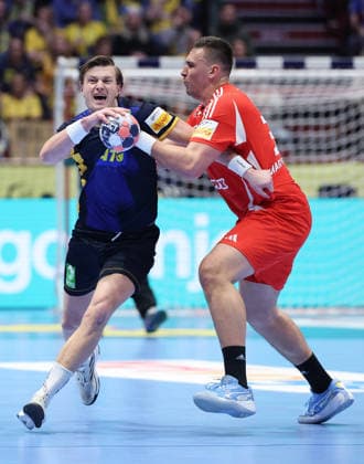 Sweden v Hungary - MenÂ s EHF EURO 2026 MALMO, SWEDEN - JANUARY 27: Jonathan Carlsbogard of Sweden and Richard Bodo of Hungary in action during the Men s EHF Euro 2026 match between Sweden adn Hungary at Malmo Arena on January 27, 2026 in Malmo, Sweden.  SanjinxStrukic PIXSELL