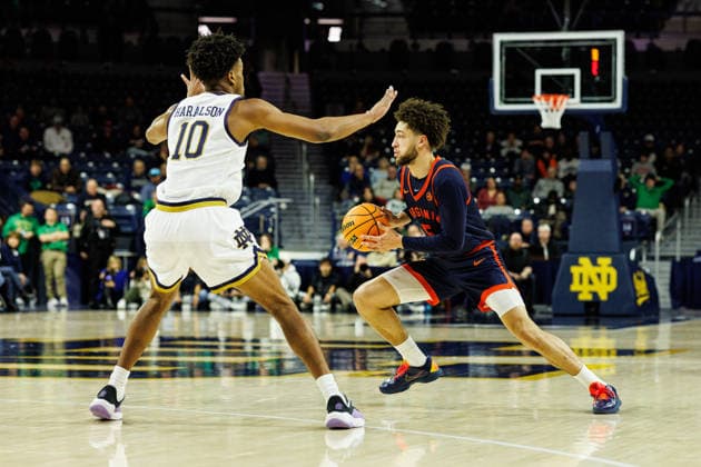January 27, 2026: Virginia guard Sam Lewis (5) drives to the lane as Notre Dame forward Jalen Haralson (10) defends during NCAA, College League, USA basketball game action between the Virginia Cavaliers and the Notre Dame Fighting Irish at Purcell Pavilion at the Joyce Center in South Bend, Indiana. CSM. South Bend United States of America - ZUMAc04_ 20260127_zma_c04_126 Copyright: xJohnxMersitsx