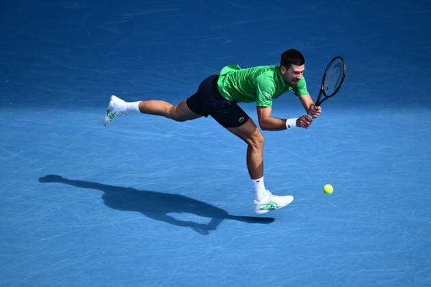 TENNIS AUSTRALIAN OPEN, Novak Djokovic of Serbia in action during the men™s quarterfinals against Lorenzo Musetti of Italy on day 11 of the 2026 Australian Open tennis tournament at Melbourne Park in Melbourne, Wednesday, January 22, 2026. ( NO ARCHIVING MELBOURNE VICTORIA AUSTRALIA  Copyright: xJOELxCARRETTx 20260128169530940108