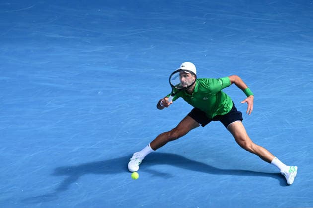 TENNIS AUSTRALIAN OPEN, Novak Djokovic of Serbia in action during the men™s quarterfinals against Lorenzo Musetti of Italy on day 11 of the 2026 Australian Open tennis tournament at Melbourne Park in Melbourne, Wednesday, January 22, 2026. ( NO ARCHIVING MELBOURNE VICTORIA AUSTRALIA  Copyright: xJOELxCARRETTx 20260128170259511943