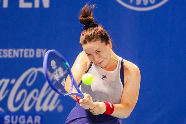 (260128) -- MANILA, Jan. 28, 2026 -- Sun Lulu of New Zealand competes during the women s singles round of 32 match between Zhu Lin of China and Sun Lulu of New Zealand at the WTA, Tennis Damen Philippine Women s Open in Manila, the Philippines, Jan. 27, 2026. ) (SP)THE PHILIPPINES-MANILA-TENNIS-WTA PHILIPPINE WOMEN S OPEN-SINGLES ROUELLExUMALI 