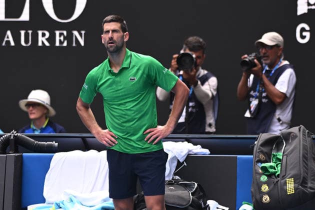 TENNIS AUSTRALIAN OPEN, Novak Djokovic of Serbia after Lorenzo Musetti of Italy retired due to injury during their men™s quarterfinals match on day 11 of the 2026 Australian Open tennis tournament at Melbourne Park in Melbourne, Wednesday, January 22, 2026. ( NO ARCHIVING MELBOURNE VICTORIA AUSTRALIA  Copyright: xJOELxCARRETTx 20260128198576050099