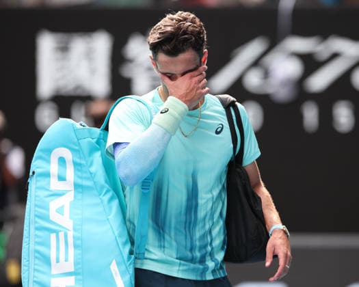Lorenzo Musetti ITA leaves the court after retiring due to injury, Australian Open 2026 Melbourne Park, Melbourne, Victoria, Australia Copyright: xJuergenxHasenkopfx