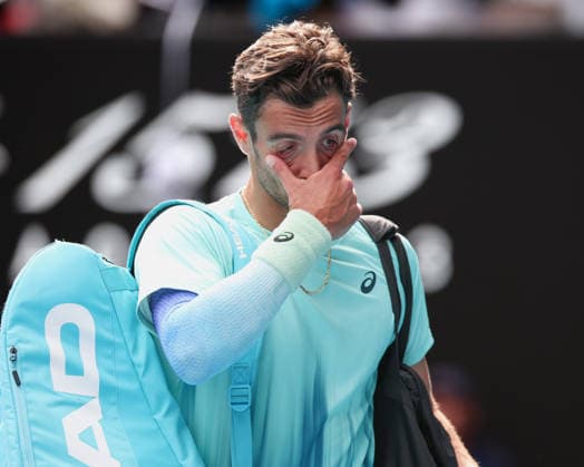 Lorenzo Musetti ITA leaves the court after retiring due to injury, Australian Open 2026 Melbourne Park, Melbourne, Victoria, Australia Copyright: xJuergenxHasenkopfx