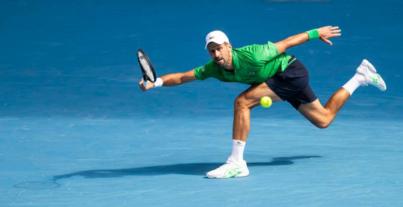 (260128) -- MELBOURNE, Jan. 28, 2026 -- Novak Djokovic of Serbia hits a return during the men s singles quarterfinal match between Novak Djokovic of Serbia and Lorenzo Musetti of Italy at the Australian Open tennis tournament in Melbourne, Australia, Jan. 28, 2026. (Photo by Xinhua) (SP)AUSTRALIA-MELBOURNE-TENNIS-AUSTRALIAN OPEN-MEN S SINGLES-QUARTERFINALS HuxJingchen 
