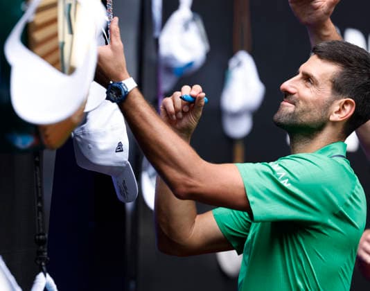 (260128) -- MELBOURNE, Jan. 28, 2026 -- Novak Djokovic of Serbia greets the audience during the men s singles quarterfinal match between Novak Djokovic of Serbia and Lorenzo Musetti of Italy at the Australian Open tennis tournament in Melbourne, Australia, Jan. 28, 2026. ) (SP)AUSTRALIA-MELBOURNE-TENNIS-AUSTRALIAN OPEN-MEN S SINGLES-QUARTERFINALS MaxPing 