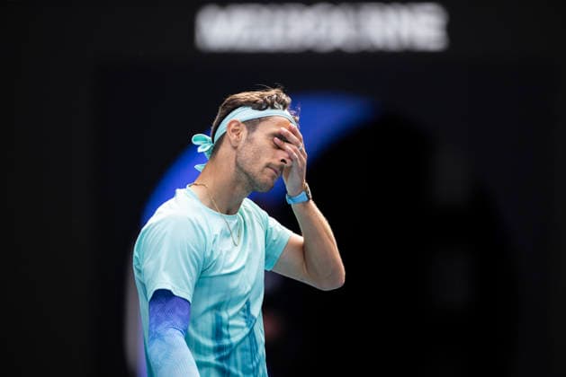 (260128) -- MELBOURNE, Jan. 28, 2026 -- Lorenzo Musetti of Italy reacts during the men s singles quarterfinal match between Novak Djokovic of Serbia and Lorenzo Musetti of Italy at the Australian Open tennis tournament in Melbourne, Australia, Jan. 28, 2026. (Photo by Xinhua) (SP)AUSTRALIA-MELBOURNE-TENNIS-AUSTRALIAN OPEN-MEN S SINGLES-QUARTERFINALS HuxJingchen 