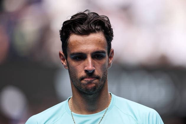 (260128) -- MELBOURNE, Jan. 28, 2026 -- Lorenzo Musetti of Italy reacts during the men s singles quarterfinal match between Novak Djokovic of Serbia and Lorenzo Musetti of Italy at the Australian Open tennis tournament in Melbourne, Australia, Jan. 28, 2026. ) (SP)AUSTRALIA-MELBOURNE-TENNIS-AUSTRALIAN OPEN-MEN S SINGLES-QUARTERFINALS MaxPing 