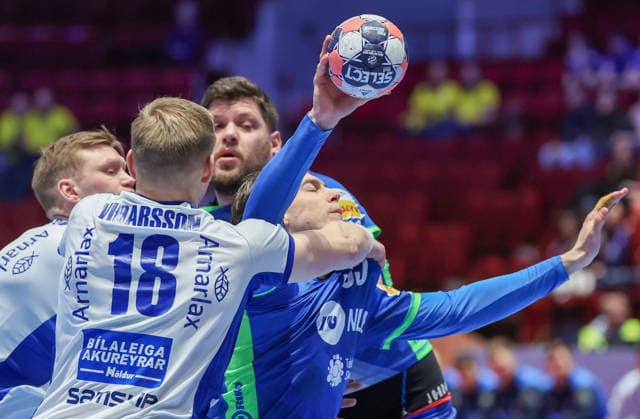Slovenia v Iceland - MenÂ s EHF EURO 2026 MALMO, SWEDEN - JANUARY 28: Ymir Orn Gislason of Iceland and Domen Makuc of Slovenia in action during the Men s EHF Euro 2026 match between Slovenia and Iceland at Malmo Arena on January 28 2026 in Malmo, Sweden.  SanjinxStrukic PIXSELL