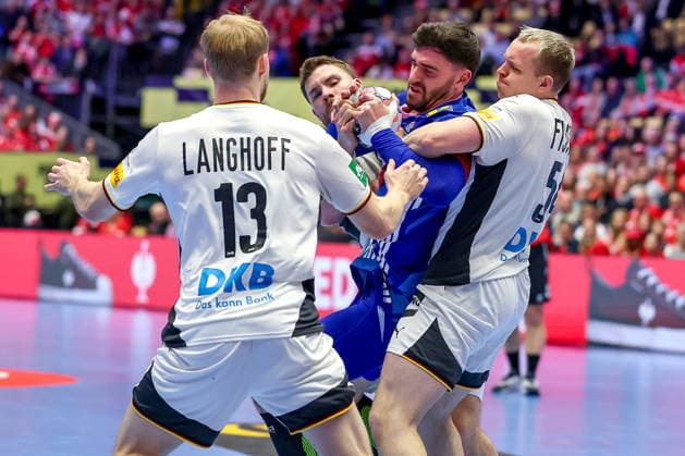 28 01 2026, Handball, Men s EHF EURO 2026, Germany France, Jyske Bank Boxing in Herning, Denmark, Main Round Renars Uscins Germany 23 is moored by Matthes Langhoff Germany 13 Johannes Golla Germany 04 Justus Fischer Germany 54 Denmark