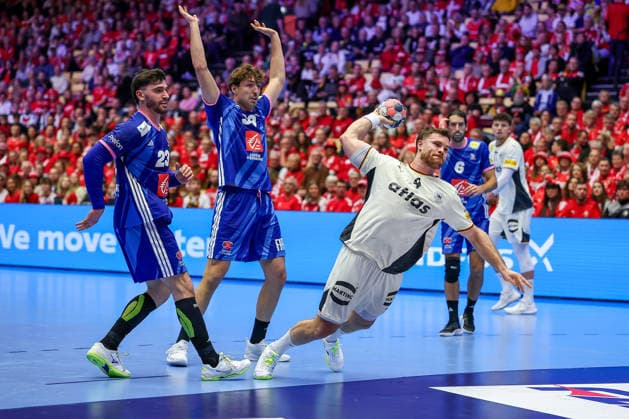 28 01 2026, Handball, Men s EHF EURO 2026, Germany France, Jyske Bank Boxing in Herning, Denmark, Main Round Johannes Golla Germany 04 throws the ball on goal against Ludovic Fabregas France 23 Thibaud Briet France 39 Denmark