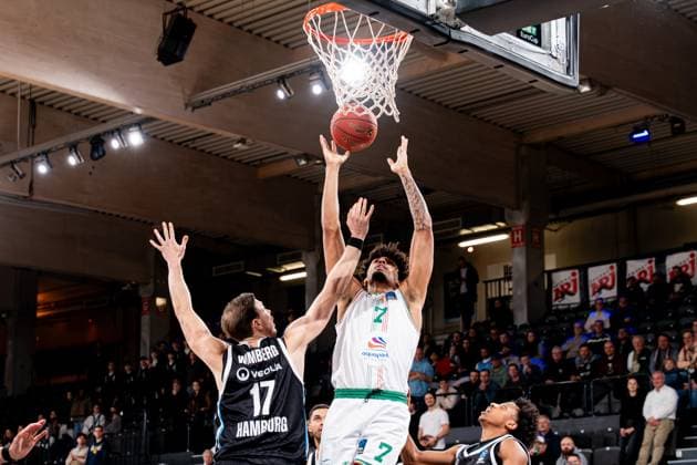 Playing action with Jakub Urbaniak 7 Slask Wroclaw throwing over Jan Niklas Wimberg 17 Veolia Towers Hamburg Playing action with Jakub Urbaniak 7 Slask Wroclaw and Jan Niklas Wimberg 17 Veolia Towers Hamburg Copyright: xPhilippHeistx