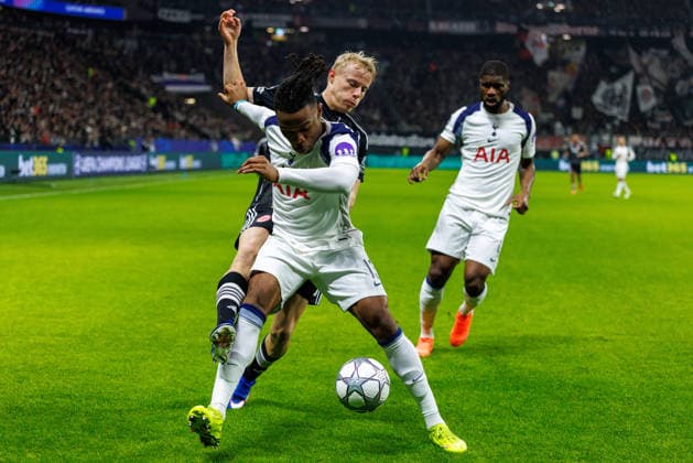 FRANKFURT, DEUTSCHLAND - JANUARY 28: Destiny Udogie (Tottenham Hotspur, 13), Kevin Danso (Tottenham Hotspur, 4) and Oscar Hojlund (Eintracht Frankfurt, 6) compete for the ball during the UEFA Champions League match between Eintracht Frankfurt vs. Tottenham Hotspur at Eintracht Frankfurt Stadium on matchday 8 of the League Phase on January 28, 2026 in Frankfurt, Deutschland. Hessen Deutschland Copyright: xStephanxHahnex