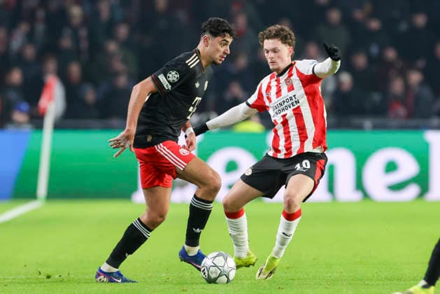 Aleksandar Pavlovic FC Bayern Munich and Paul Wanner PSV Eindhoven battle for the ball, UEFA Champions League 2025 26 League Phase MD8, PSV Eindhoven v FC Bayern Munich, PSV Stadion on January 28, 2026 in Eindhoven, Netherlands Photo by Marco Steinbrenner DeFodi Images Aleksandar Pavlovic FC Bayern München and Paul Wanner PSV Eindhoven battle for the ball, UEFA Champions League 2025 26 League Phase MD8, PSV Eindhoven v FC Bayern München, PSV Stadion, January 28, 2026 in Eindhoven, Netherlands Photo by Marco Steinbrenner DeFodi Images
