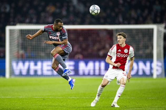 AMSTERDAM (l-r) Ayoub El Kaabi of Olympiacos, Youri Baas of Ajax during the UEFA Champions League match between AFC Ajax and Olympiacos Piraeus at the Johan Cruijff ArenA on January 28, 2026, in Amsterdam, Netherlands. KOEN VAN WEEL ANP UEFA Champions League 2025-2026 xVIxANPxSportx xxANPxIVx 548918259 originalFilename: 548918259.jpg