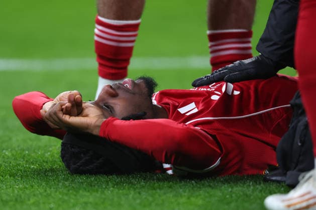 Liverpool FC v Qarabag FK - UEFA Champions League 2025 26 League Phase MD8 Jeremie Frimpong of Liverpool is injured during the UEFA Champions League 2025 26 League Phase MD8 match between Liverpool FC and Qarabag FK at Anfield on January 28, 2026 in Liverpool, England. WARNING! This Photograph May Only Be Used For Newspaper And Or Magazine Editorial Purposes. May Not Be Used For Publications Involving 1 player, 1 Club Or 1 Competition Without Written Authorisation From Football DataCo Ltd. For Any Queries, Please Contact Football DataCo Ltd on +44 (0) 207 864 9121 Liverpool Anfield England United Kingdom Copyright: xAllstarxPicturexLibraryxLtdx