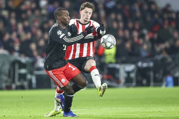 EINDHOVEN , 28-01-2026 , Philips Stadium , season 2025 2026 , UEFA Champions League football , League phase matchday 8 , match between PSV and Bayern Munchen , picture shows Bayern Munchen player Nicolas Jackson and PSV player Paul Wanner PSV - Bayern Munchen  x201144497x Copyright:
