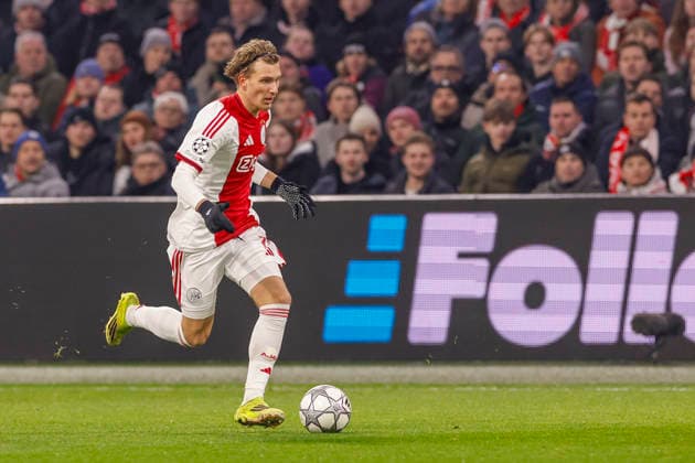 2026-01-28 AFC Ajax v Olympiacos FC - UEFA Champions League AMSTERDAM, NETHERLANDS - JANUARY 28: Mika Godts of AFC Ajax during the UEFA Champions League match between AFC Ajax and Olympiacos FC at Johan Cruijff ArenA on January 28, 2026 in Amsterdam, Netherlands. Amsterdam Johan Cruijff ArenA Netherlands Content not available for redistribution in The Netherlands directly or indirectly through any third parties. Copyright: xBenxGalx