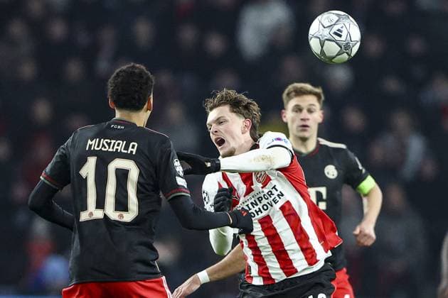 EINDHOVEN , 28-01-2026 , Philips Stadium , season 2025 2026 , UEFA Champions League football , League phase matchday 8 , match between PSV and Bayern Munchen , picture shows PSV player Paul Wanner and Bayern Munchen player Jamal Musiala PSV - Bayern Munchen  x201144505x Copyright: