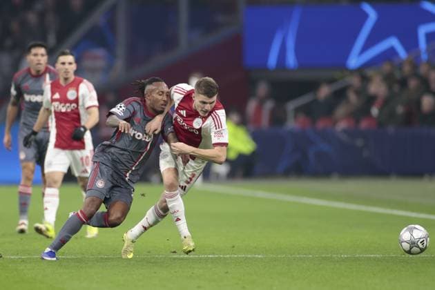 AMSTERDAM , 28-01-2026 , JohanCruijff ArenA , season 2025 2026 , UEFA Champions League football , League phase Matchday 8 , match between Ajax and Olympiacos , picture shows Olympiacos player Gelson Martins, Ajax player Anton Gaaei Ajax - Olympiacos  x201144513x Copyright: