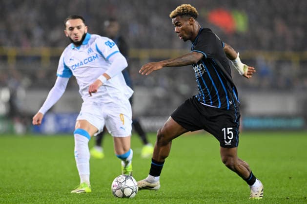 260127 Club Brugge vs Marseille Amine Gouiri (9) of Marseille defending on Raphael Onyedika (15) of Club Brugge during the Uefa Champions League 8th matchday in the League phase game in season 2025 - 2026 between Club Brugge KV and Olympique de Marseille on January 28 , 2026 in Brugge, Belgium. (Photo by David Catry Isosport) Brugge Belgium  Copyright: xDavidxCatryx 20260128DC2_7621