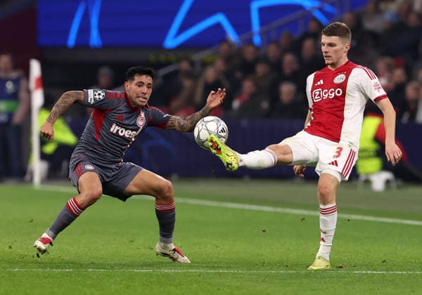 Anton Gaaei of AFC Ajax with Francis Ortega of Olympiakos Piraeus during the match AFC Ajax Amsterdam vs Olympiacos Piraues at the Johan Cruijff ArenA for the UEFA Champions League season 2025 2026 in AMSTERDAM, Netherlands on 28 january 2026