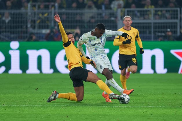 UEFA Champions League Borussia Dortmund Inter Milan on 28 01 2026 at Signal Iduna Park in Dortmund Emre Can Dortmund 23 in a duel against Marcus Thuram Inter 9 MH