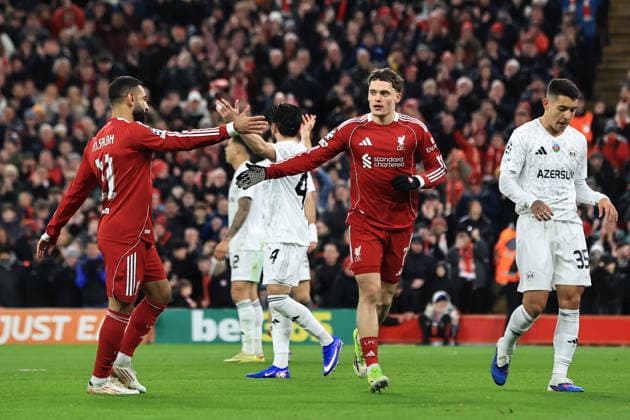 28th January 2026; Anfield, Liverpool, Merseyside, England; UEFA Champions League Football, Liverpool versus Qarabag; Florian Wirtz of Liverpool celebrates with team mate Mohammed Salah after scoring for 2-0 after 21 minutes  DavidxBlunsden Content restricted for UK based newspaper