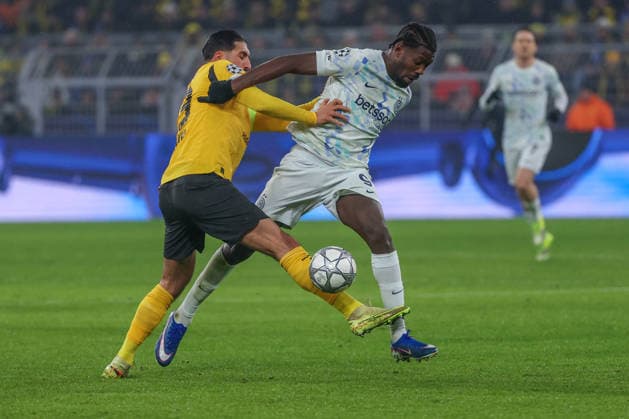 UEFA Champions League Borussia Dortmund Inter Milan on 28 01 2026 at Signal Iduna Park in Dortmund Emre Can Dortmund 23 in a duel against Marcus Thuram Inter 9 MH