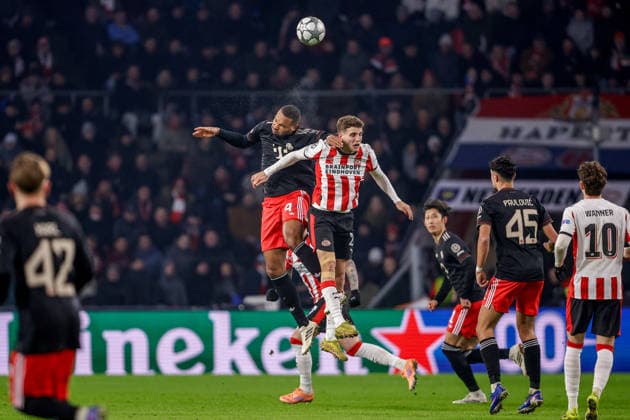 2026-01-28 PSV Eindhoven v FC Bayern Munich - UEFA Champions League 2025 26 League Phase MD8 EINDHOVEN, NETHERLANDS - JANUARY 28: Jonathan Tah of FC Bayern Munich, Guus Til of PSV Eindhoven during the UEFA Champions League 2025 26 League Phase MD8 match between PSV Eindhoven and FC Bayern Munich at Philips Stadion on January 28, 2026 in Eindhoven, Netherlands. Eindhoven Philips Stadion Netherlands Content not available for redistribution in The Netherlands directly or indirectly through any third parties. Copyright: xBroerxvanxdenxBoomx