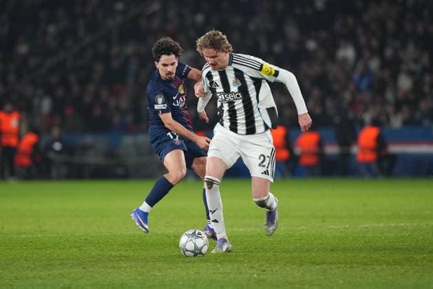 Nick Woltemade of Newcastle takes on Vitinha of PSG Paris Saint-Germain v Newcastle United, UEFA Champions League, Group Stage, Football, Parc des Princes, Paris, France - 28 Jan 2026Paris Parc des Princes France EDITORIAL USE ONLY No use with unauthorised audio, video, data, fixture lists, club league logos or live services. Online in-match use limited to 120 images, no video emulation. No use in betting, games or single club league player publications. Copyright: xDavexWinter Shutterstockx 16429499bd