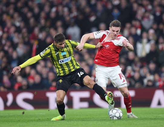 London, England, 28th January 2026. Aleksandr Martynovich of FC Kairat Almaty and Viktor Gyokeres of Arsenal during the Arsenal vs Kairat Almaty UEFA Champions League match at the Emirates Stadium, London. Picture credit should read: David Klein Sportimage EDITORIAL USE ONLY. No use with unauthorised audio, video, data, fixture lists, club league logos or live services. Online in-match use limited to 120 images, no video emulation. No use in betting, games or single club league player publications. SPI_038_DK_Arsenal_Alamty SPI-4488-0039