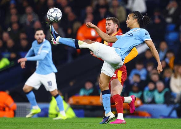 Nathan Ake of Manchester City and Baris Alper Yilmaz of Galatasaray Manchester City v Galatasaray, UEFA Champions League, Group Stage, Football, Etihad Stadium, Manchester, UK - 28 Jan 2026Manchester Etihad Stadium United Kingdom EDITORIAL USE ONLY No use with unauthorised audio, video, data, fixture lists, club league logos or live services. Online in-match use limited to 120 images, no video emulation. No use in betting, games or single club league player publications. Copyright: xMattxWest Shutterstockx 16429496t