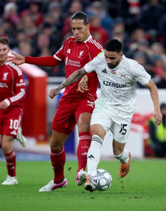 Liverpool FC v Qarabag FK - UEFA Champions League 2025 26 League Phase MD8 Virgil van Dijk of Liverpool and Leandro Andrade of Qarabag FK challenge during the UEFA Champions League 2025 26 League Phase MD8 match between Liverpool FC and Qarabag FK at Anfield on January 28, 2026 in Liverpool, England. WARNING! This Photograph May Only Be Used For Newspaper And Or Magazine Editorial Purposes. May Not Be Used For Publications Involving 1 player, 1 Club Or 1 Competition Without Written Authorisation From Football DataCo Ltd. For Any Queries, Please Contact Football DataCo Ltd on +44 (0) 207 864 9121 Liverpool Anfield England United Kingdom Copyright: xAllstarxPicturexLibraryxLtdx