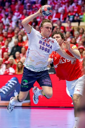 28 01 2026, Handball, Men s EHF EURO 2026, Denmark Norway, Jyske Bank Boxing in Herning, Denmark, Main Round Tobias Schjolberg Grondahl Norway 22 in a duel against Niclas Vest Kirkelokke Denmark 03 Denmark
