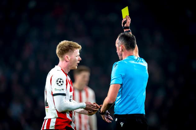 PSV Eindhoven midfielder Jerdy Schouten gets yellow from Referee Joao Pinheiro during the match PSV Eindhoven vs FC Bayern Munchen at the Philips stadium for the Champions League phase Matchday 8 season 2025 2026 in EINDHOVEN, Netherlands on 28 01 2026,