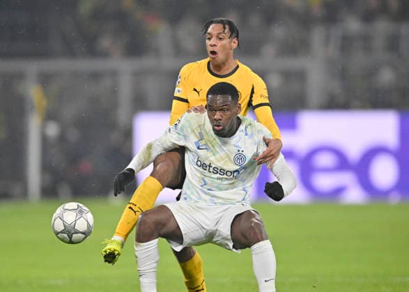 v l Filippo Mane Borussia Dortmund , Ange Yoan Bonny Inter Milan action, duel, Football Champions League, Borussia Dortmund Inter Milan, Matchday 8, on 28 01 2026 in Dortmund Germany UEFA regulations prohibit any use of photographs as image sequences and or quasi video Â