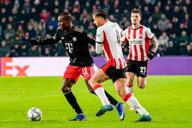 Nicolas Jackson of FC Bayern Munchen battles for possession with Armando Obispo of PSV Eindhoven PSV Eindhoven v FC Bayern Munchen, UEFA Champions League 2025 26 League Phase MD8, PSV Eindhoven v FC Bayern Munchen, PSV Stadion, January 28, 2026, Eindhoven, Netherlands.