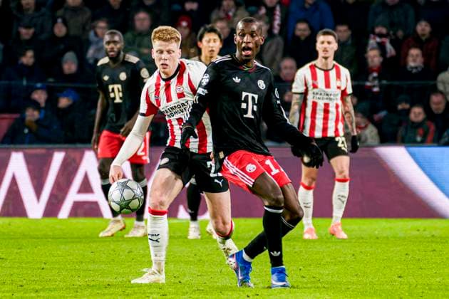 Jerdy Schouten of PSV Eindhoven battles for possession with Nicolas Jackson of FC Bayern Munchen PSV Eindhoven v FC Bayern Munchen, UEFA Champions League 2025 26 League Phase MD8, PSV Eindhoven v FC Bayern Munchen, PSV Stadion, January 28, 2026, Eindhoven, Netherlands.