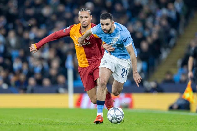 28th January 2026; Etihad Stadium, Manchester, England; UEFA Champions League Football, Manchester City versus Galatasaray; Rayan Ait-Nouri of Manchester City under pressure from Leroy Sane of Galatasaray  TimxWilliams Content restricted for UK based newspaper