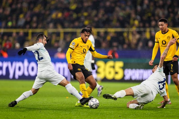 DORTMUND, GERMANY - JANUARY 28: Filippo Mane of Borussia Dortmund is challenged by Henrikh Mkhitaryan of FC Internazionale and Francesco Acerbi of FC Internazionale during the UEFA Champions League 2025 26 League Phase MD8 match between Borussia Dortmund and FC Internazionale Milano at BVB Stadion Dortmund on January 28, 2026 in Dortmund, Germany. (Photo by Rene Nijhuis) SPO  Copyright: xRenexNijhuis