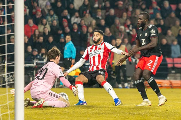 Goalkeeper Jonas Urbig FC Bayern Munich , Ismael Saibari PSV Eindhoven and Dayot Upamecano FC Bayern Munich battle for the ball during the UEFA Champions League 2025 26 League Phase MD8 match between PSV Eindhoven and FC Bayern Munich at PSV Stadion on January 28, 2026 in Eindhoven, Netherlands