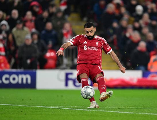 Liverpool, England, 28th January 2026. Mohamed Salah of Liverpool scoring their third goal during the Liverpool vs Qarabag FK UEFA Champions League match at Anfield, Liverpool. Picture credit should read: Harriet Massey Sportimage EDITORIAL USE ONLY. No use with unauthorised audio, video, data, fixture lists, club league logos or live services. Online in-match use limited to 120 images, no video emulation. No use in betting, games or single club league player publications. SPI_045_HM_Lpool_Qarabag SPI-4487-0046