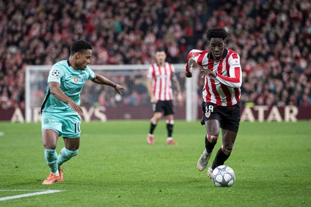 UEFA Champions League Athletic Club vs Sporting Clube de Portugal Adama Boiro of Athletic Club attempt to hold possession whilst under pressure from Geny Catamo of Sporting Clube de Portugal during Champions League 2025-26 League phase match between Athletic Club and Sporting Clube de Portugal at San mames stadium. Bilbo (Basque Country). January 28, 2026. (Gari Garaialde Bostok Photo) Bilbao Bizkaia Spain Editorial Use Only  Copyright: xGarikoitzxGaraialdex xBostokxPhotox Bostok Photo GarixGaraialdex GG2601280333