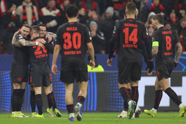 Alejandro Grimaldo Bayer 04 Leverkusen celebrates after scoring his team s third goal with teammates during the UEFA Champions League 2025 26 League Phase MD8 match between Bayer 04 Leverkusen and Villarreal CF at BayArena on January 28, 2026 in Leverkusen, Germany Photo by Oliver Kaelke DeFodi Images