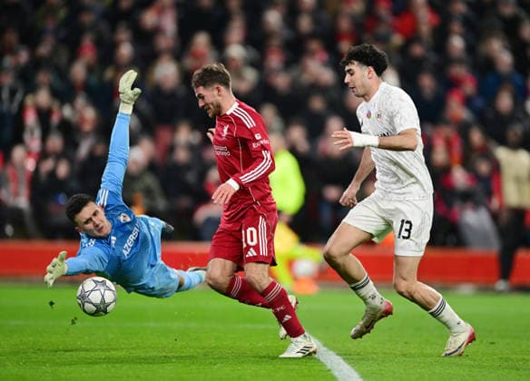 Liverpool, England, 28th January 2026. Alexis Mac Allister of Liverpool scores their fifth goal during the Liverpool vs Qarabag FK UEFA Champions League match at Anfield, Liverpool. Picture credit should read: Harriet Massey Sportimage EDITORIAL USE ONLY. No use with unauthorised audio, video, data, fixture lists, club league logos or live services. Online in-match use limited to 120 images, no video emulation. No use in betting, games or single club league player publications. SPI_056_HM_Lpool_Qarabag SPI-4487-0055