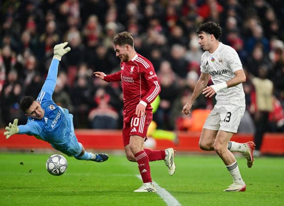 Liverpool, England, 28th January 2026. Alexis Mac Allister of Liverpool scores their fifth goal during the Liverpool vs Qarabag FK UEFA Champions League match at Anfield, Liverpool. Picture credit should read: Harriet Massey Sportimage EDITORIAL USE ONLY. No use with unauthorised audio, video, data, fixture lists, club league logos or live services. Online in-match use limited to 120 images, no video emulation. No use in betting, games or single club league player publications. SPI_057_HM_Lpool_Qarabag SPI-4487-0056