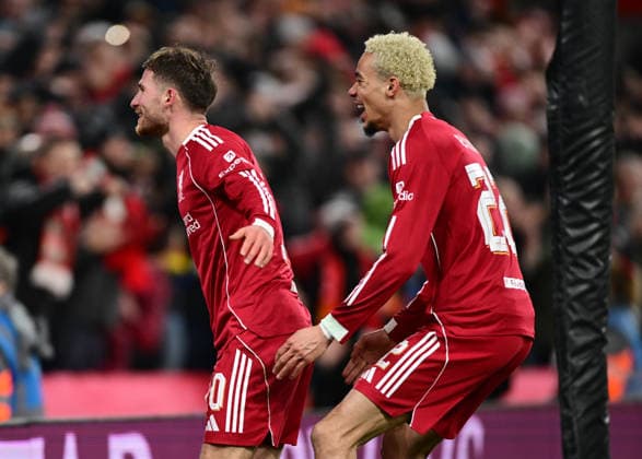 Liverpool, England, 28th January 2026. Alexis Mac Allister of Liverpool (l) celebrates scoring their fifth goal with Hugo Ekitike of Liverpool (r) during the Liverpool vs Qarabag FK UEFA Champions League match at Anfield, Liverpool. Picture credit should read: Harriet Massey Sportimage EDITORIAL USE ONLY. No use with unauthorised audio, video, data, fixture lists, club league logos or live services. Online in-match use limited to 120 images, no video emulation. No use in betting, games or single club league player publications. SPI_061_HM_Lpool_Qarabag SPI-4487-0060