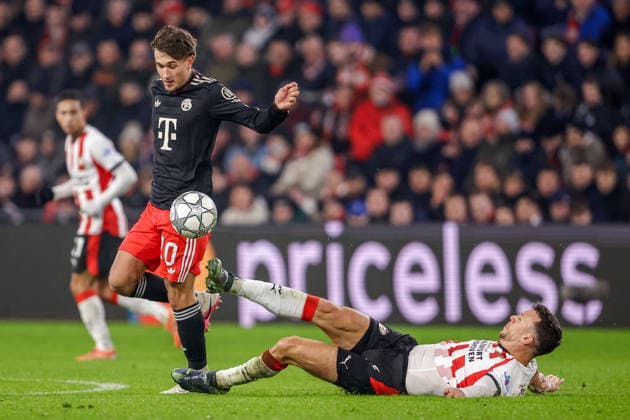 2026-01-28 PSV Eindhoven v FC Bayern Munich - UEFA Champions League 2025 26 League Phase MD8 EINDHOVEN, NETHERLANDS - JANUARY 28: Tom Bischof of FC Bayern Munich, Ivan Perisic of PSV Eindhoven during the UEFA Champions League 2025 26 League Phase MD8 match between PSV Eindhoven and FC Bayern Munich at Philips Stadion on January 28, 2026 in Eindhoven, Netherlands. Eindhoven Philips Stadion Netherlands Content not available for redistribution in The Netherlands directly or indirectly through any third parties. Copyright: xBroerxvanxdenxBoomx